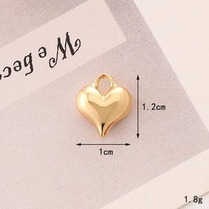 Detailed view of golden heart pendant with 1.2cm height, 1cm width, and 1.8g weight