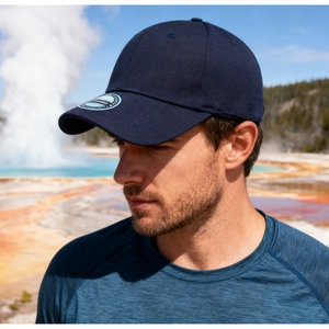 Detail of navy blue structured baseball cap with original flexfit sticker on the brim