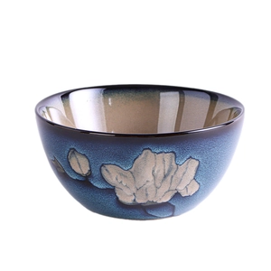 Japanese style ceramic ramen bowl with deep blue gradient glaze and white floral patterns