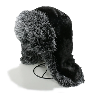 Faux fox fur trapper hat in black and grey for winter warmth and outdoor skiing