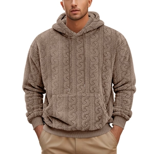 Detailed texture of brown teddy fleece hoodie with intricate cable knit pattern