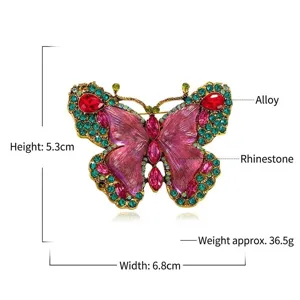 Detailed view of crystal butterfly brooch with size markers 5.3cm height and 6.8cm width