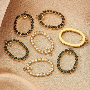 Oval stainless steel crystal charms in gold, black, clear and green for DIY jewelry