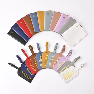 Detailed arrangement of colorful PU leather passport covers and luggage tags in a fan layout