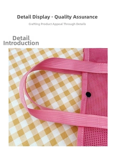 Detail of pink mesh tote bag showing reinforced woven handles and black snap closure