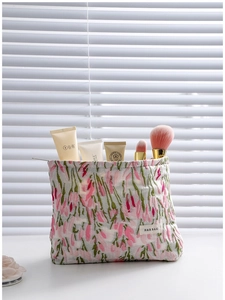 Portable floral fabric makeup bag with large capacity for women's toiletries