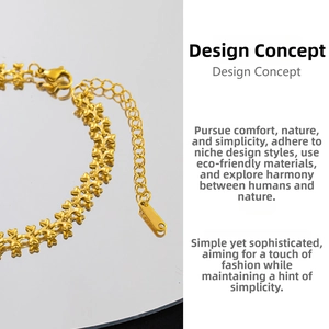 Detail view of a gold-plated heart-link chain necklace with lobster clasp and extender