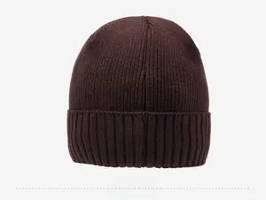 Detailed back view of a dark brown ribbed knit beanie with thick fold-over cuff design