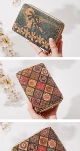 Detail of cork texture short zipper wallet featuring floral palm and mandala prints