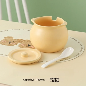 Detail of 1400ml cream ceramic seasoning jar with lid and matching white spoon