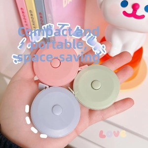 Three mini macaron retractable measuring tapes with push-button for waist and sewing measurements