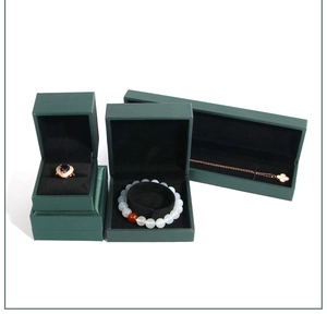 Deep green jewelry box set including ring, bracelet and necklace boxes with black velvet