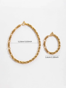 Ensemble collier et bracelet à grosse chaîne dorée avec dimensions sur fond blanc