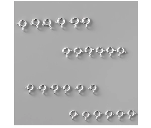 Macro detail of high-quality S925 sterling silver spring ring clasps for jewelry making