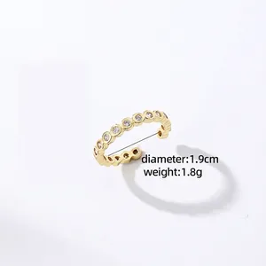 Minimalist gold open ring with circular zircon settings 1.9cm diameter 1.8g
