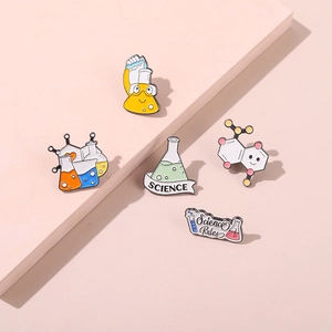 5-piece science lab enamel pin set featuring colorful flasks and DNA molecules