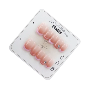 Handmade cherry pink gradient press-on nails with sparkling rhinestones and glitter tips