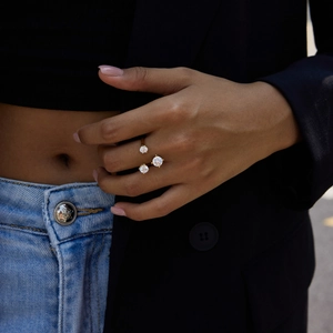 Minimalist gold titanium steel open ring with three circular cubic zirconia crystals