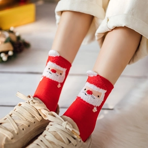 Festive red Christmas crew socks featuring 3D Santa Claus ears and warm knit cotton