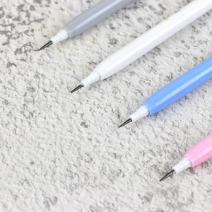 Close-up of colorful stackable bullet pencils showing fine tip details and assorted colors