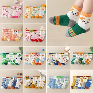 Detail view of cotton baby socks featuring colorful cartoon animal patterns in a 5-pack set