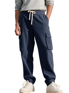 Detail view showing textured blue corduroy fabric and multi-pocket cargo design on joggers