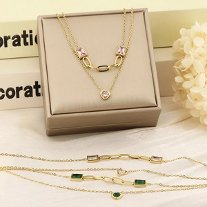 Double-layered gold necklace featuring zircon rectangle and heart pendants in three colors
