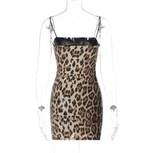 Close-up of leopard print sequins and spaghetti straps on a mini fashion dress
