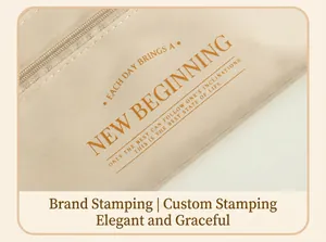 Detail of beige fabric travel passport pouch with gold stamped New Beginning lettering