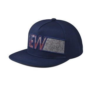 Detailed close-up of navy blue flat brim snapback cap featuring NEW embroidery