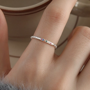 Adjustable S925 sterling silver ring with colorful sparkling zircon stones on model hand
