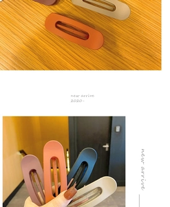 Detail view of large matte hair clips in Morandi colors for women casual styling