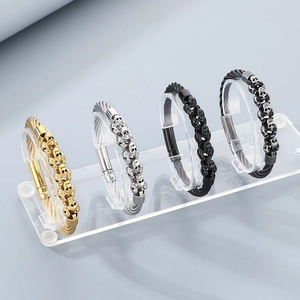 Punk skull stainless steel cable bracelets in gold, silver, black, and antique finishes