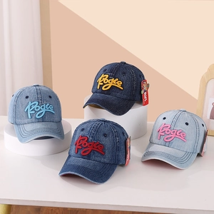 Kids denim baseball caps with 3D embroidery in light, medium, and dark blue washes