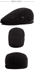 Detailed views of black cotton newsboy cap showing embroidery and metal buckle details