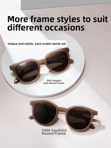 Detail view of retro amber oval and semi-round PC frame sunglasses on a minimalist tray