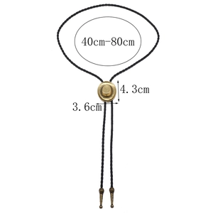 Detail view of bronze cowboy hat bolo tie pendant with adjustable cord and measurements