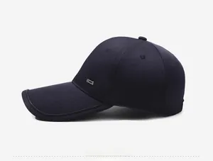 Detailed side view of navy blue baseball cap with silver metal buckle and curved brim