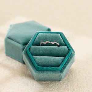 S925 sterling silver wavy ring with pavé diamonds in a luxury velvet jewelry box