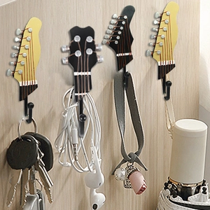 Creative resin guitar head hooks set of four hanging keys and bags on wooden wall