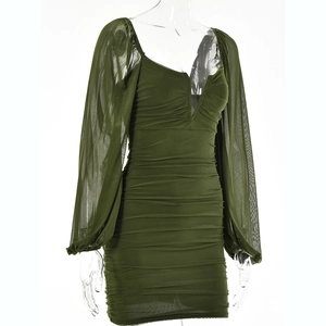 Detail of olive green mesh dress featuring elegant ruched texture and sheer long sleeves