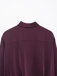 Detailed back view of wine red poplin shirt yoke showing smooth satin-like glossy texture