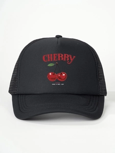 Detailed close-up of a black mesh trucker hat with cherry print and curved brim stitching