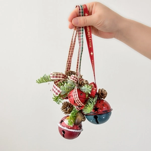 Vintage Christmas bells hanging ornament with pinecones, stars and Merry Christmas ribbon