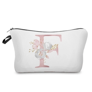 Close-up of pink floral letter F print on a white cosmetic bag with black zipper