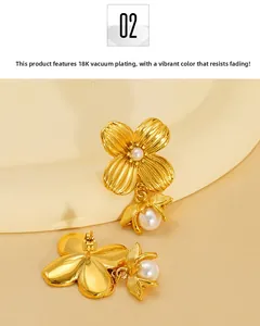 Macro detail of 18K gold plated flower earrings with pearl drop and needle structure