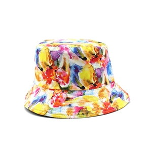 Double-sided reversible bucket hat with colorful abstract watercolor floral print patterns