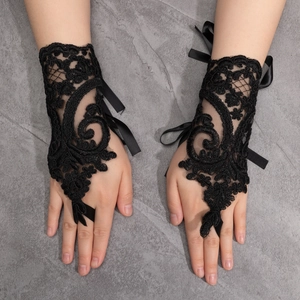 Elegant black lace fingerless gloves with satin ribbon bows for Halloween or parties