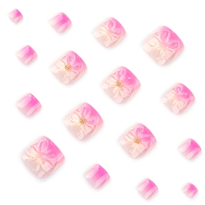 Unghie finte piedi sfumate rosa con fiori 3D e dettagli in microperle d'oro