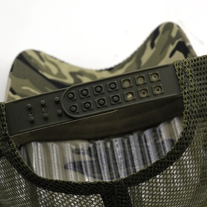 Close-up of adjustable snapback buckle and breathable mesh on camo baseball cap